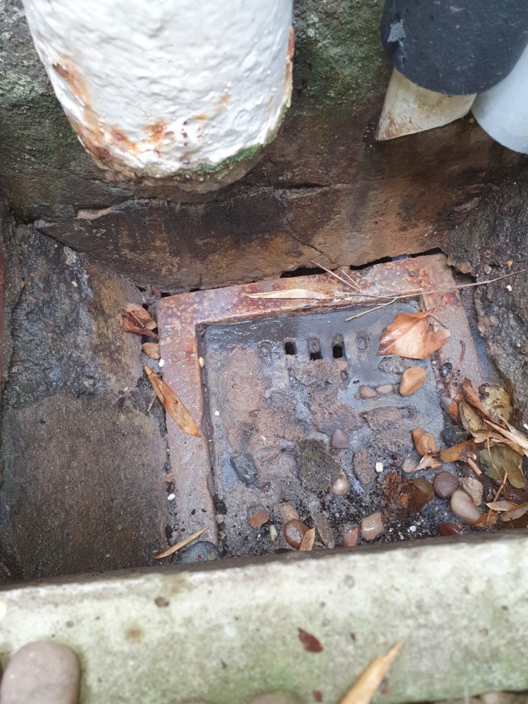Kitchen external drain where rats are accessing wall cavities to travel up into loft at a property in East Sussex Kitchen external drain where rats are accessing wall cavities to travel up into loft